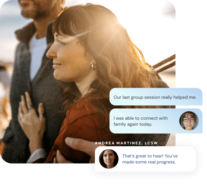 Person smiling while video chatting on laptop